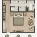 Chambre principale aménagée avec un coin salon et un dressing intégré, favorisant le confort et la sérénité.