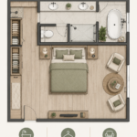 Chambre principale aménagée avec un coin salon et un dressing intégré, favorisant le confort et la sérénité.