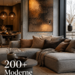 Un salon moderne avec un canapé gris et des éléments de décoration élégants.